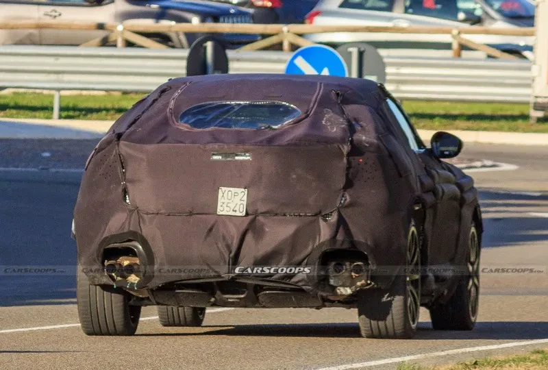 image-ferraris-purosangue-suv-spied-with-production-body-for-the-first-time-163819132684349.webp